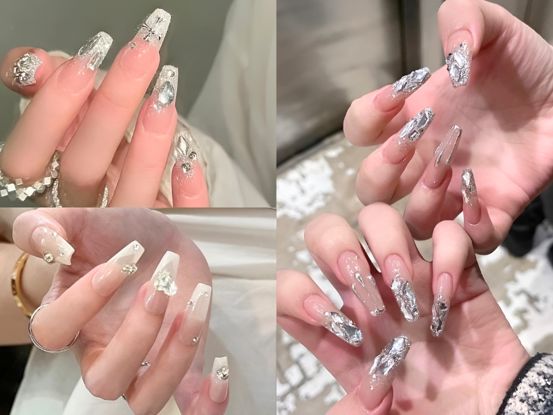 Bộ móng tay dài được trang trí lấp lánh với kim tuyến và đá, tạo kiểu sáng tạo và nổi bật.