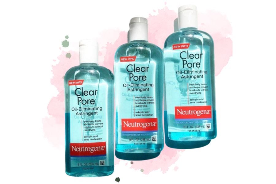 Ba chai dung dịch làm sạch da Clear Pore Oil-Eliminating Astringent của Neutrogena trên nền màu hồng.