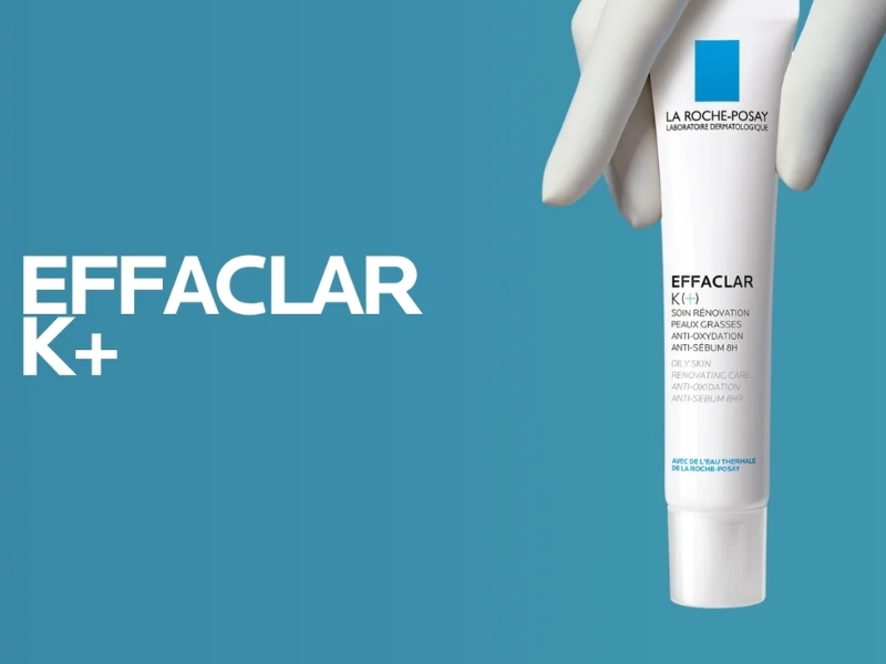 2a4fd269-kem-duong-se-khit-lo-chan-long-4 Tuýp kem dưỡng da màu trắng trên nền xanh, bên trái có chữ "Effaclar K+" màu trắng.