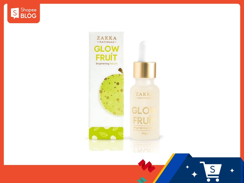Hộp và chai serum làm sáng da với thiết kế màu trắng và xanh lá, kèm ống nhỏ giọt màu vàng.