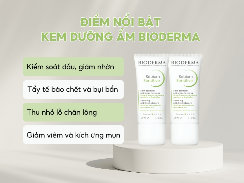 3c26ed2c-kem-duong-am-bioderma-cho-da-dau-mun-1 Hai tuýp kem dưỡng Bioderma đặt trên bệ tròn, với các đặc điểm nổi bật về kiểm soát dầu và chăm sóc da.