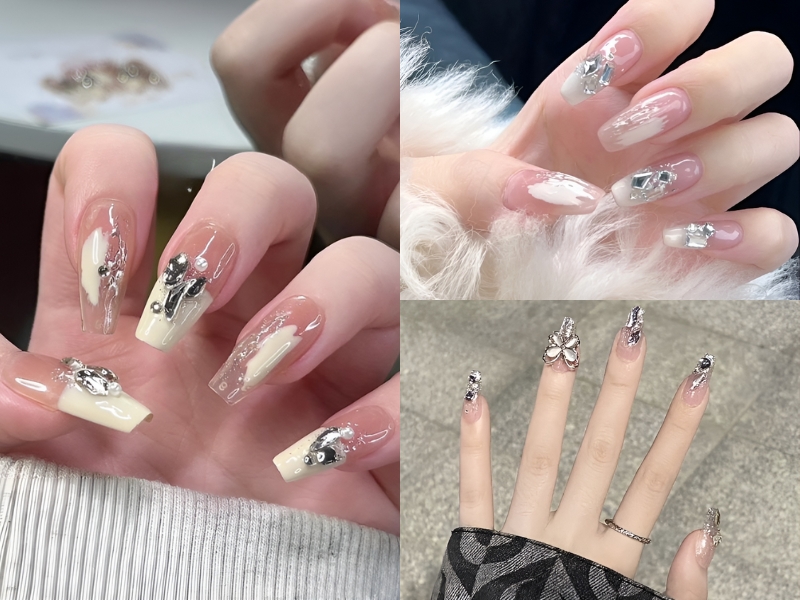 Bộ móng tay được trang trí với đá quý và họa tiết nổi bật trên nền sơn bóng và màu sắc khác nhau.