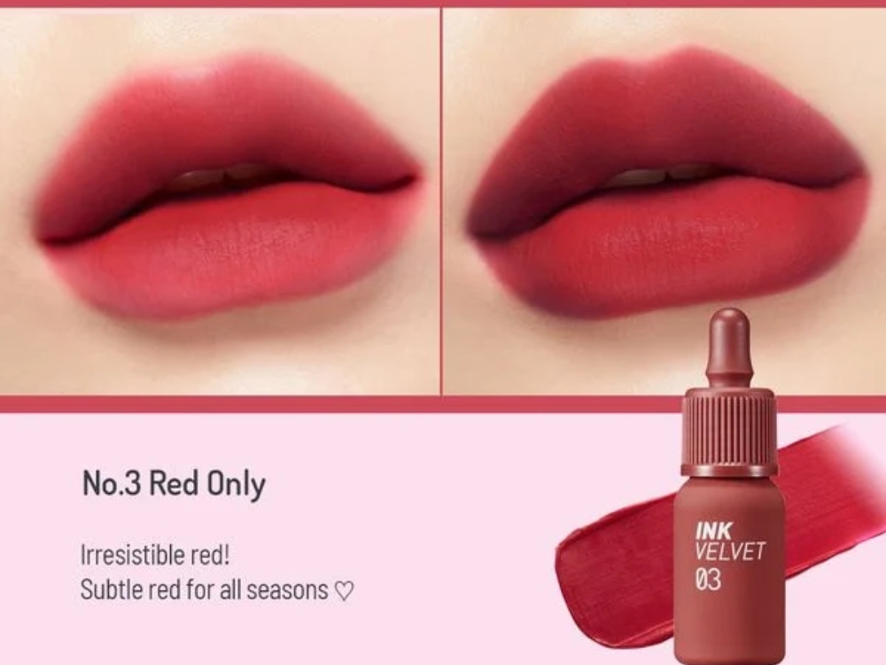 Hình ảnh son môi màu đỏ tươi trên môi, kèm chai son Ink Velvet số 03 bên cạnh.