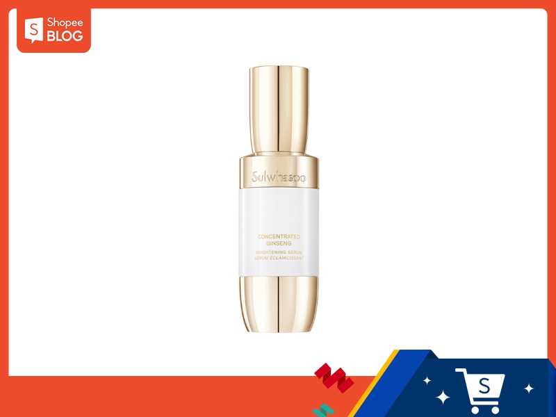Chai serum màu vàng với nhãn hiệu, nằm trên nền trắng, có khung viền màu cam và biểu tượng giỏ hàng.