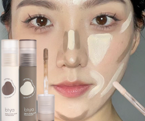 Người mẫu đang sử dụng sản phẩm trang điểm từ hai chai biya, với các vệt kem trên mặt để tạo khối.