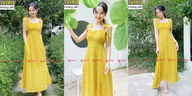 Bắp chân to mặc váy gì? Người phụ nữ mặc váy vàng hoa đứng trong vườn và trước nền trắng, tay cầm lá cây, khuôn mặt tươi cười.