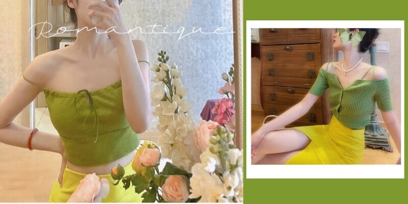 Người mặc áo xanh lá cây, váy vàng, ngồi bên cạnh hoa và tủ gỗ, trong bối cảnh nội thất sáng sủa.