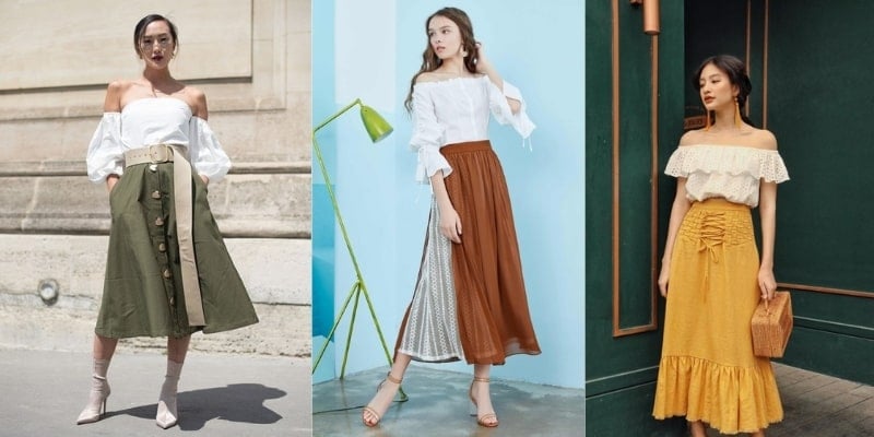 Ba người mặc trang phục thời trang với áo trễ vai và váy dài, tạo dáng trước nền tường và cửa.