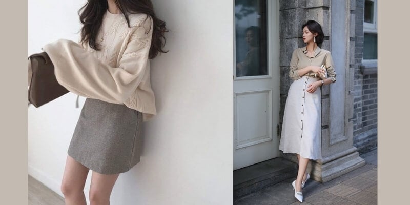 Người mẫu mặc trang phục thu đông với áo len và váy, tạo dáng cạnh tường và cửa ra vào.