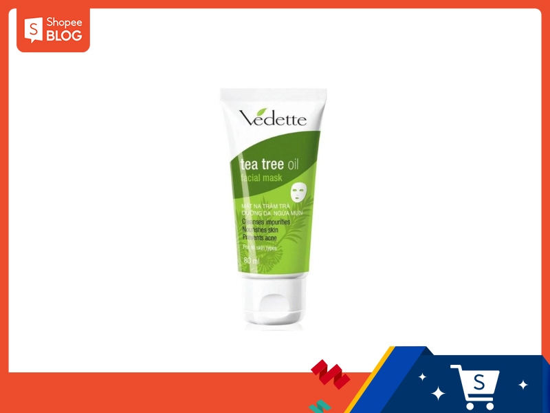 Tuýp mặt nạ tràm trà Vedette 80ml, nền trắng, nắp màu trắng, chữ và họa tiết màu xanh lá.