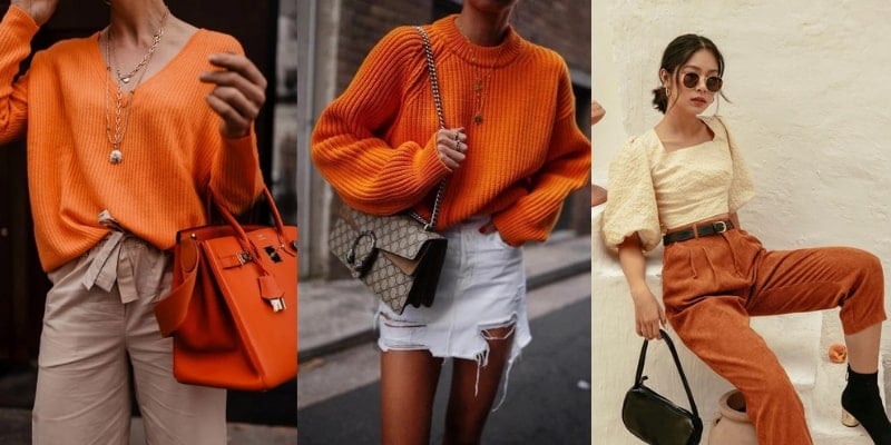 Ba người mặc trang phục thời trang mùa thu với áo len màu cam và phụ kiện túi xách, tạo dáng trước ống kính.