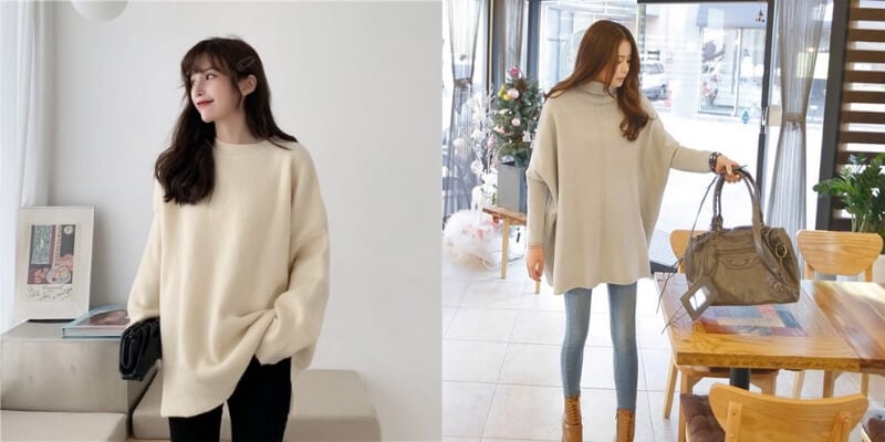 Hai người mặc áo len rộng màu be trong phòng sáng, một người cầm túi xách, cả hai đều có mái tóc dài.