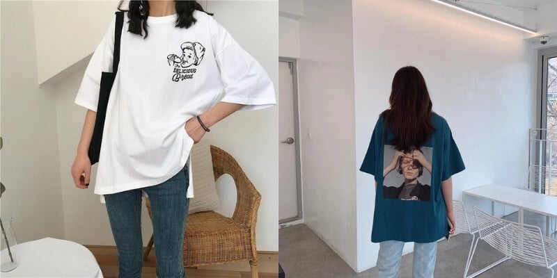 Người mặc áo thun in hình, đứng trong phòng, một người quay lưng và một người nhìn về phía trước.