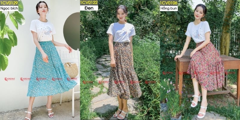 Ba người mặc áo trắng và váy hoa đứng tạo dáng ngoài trời, xung quanh là cây cối xanh tươi.