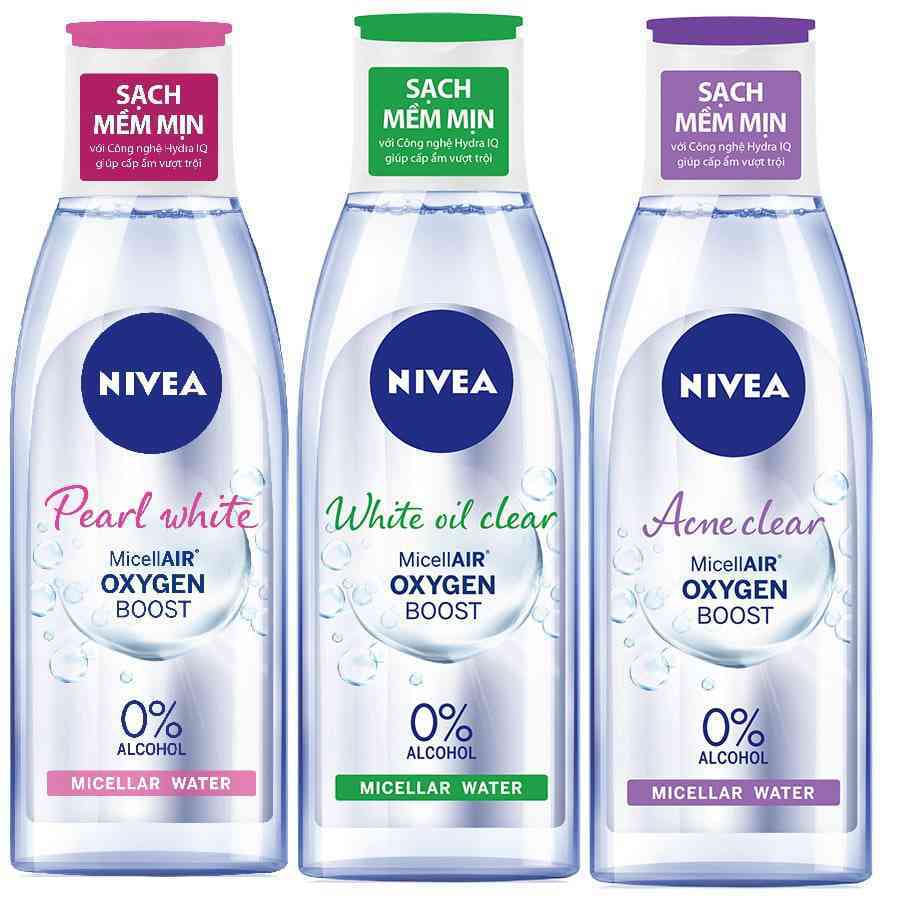 ntt-8 Ba chai nước tẩy trang Nivea MicellAIR Oxygen Boost với nhãn màu hồng, xanh lá cây và tím, không chứa cồn.