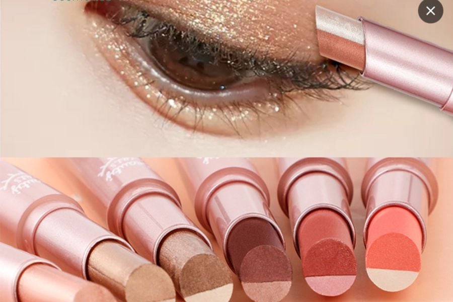 Mắt được trang điểm với phấn mắt lấp lánh, bên dưới là các thỏi phấn mắt màu sắc khác nhau.