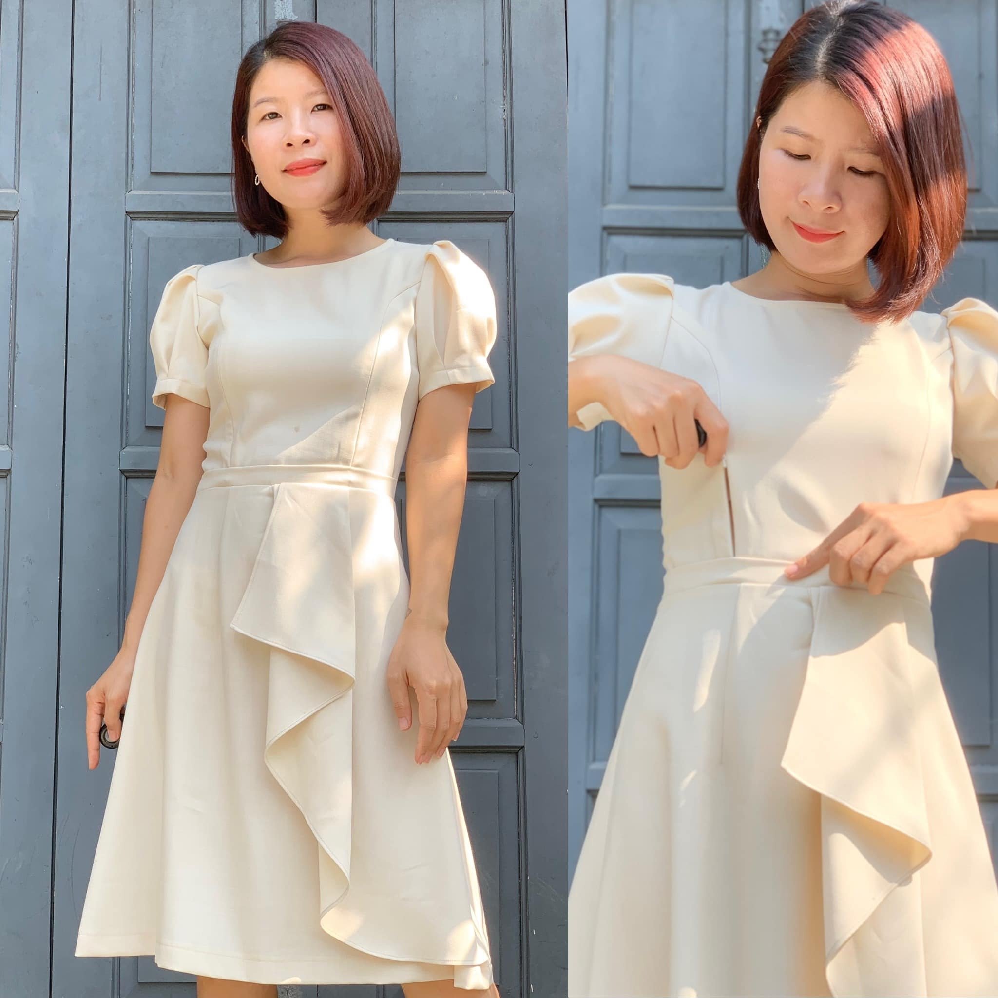 Người phụ nữ mặc váy trắng đứng trước cửa, tay đang chỉ vào phần eo của chiếc váy.