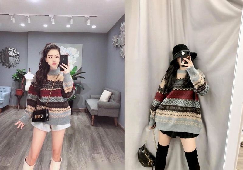 Hai người trong phòng thử đồ, mặc áo len họa tiết, chụp ảnh tự sướng trước gương.