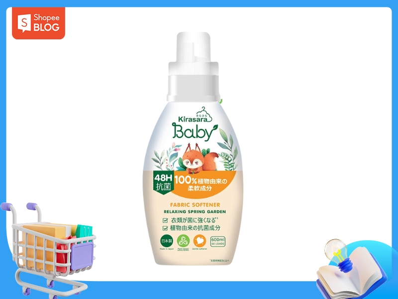 Chai nước xả vải Kirasara Baby 600ml, nhãn màu trắng cam, có hình minh họa động vật dễ thương.