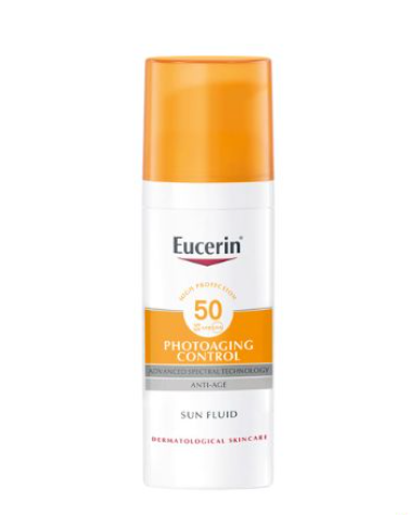 Chai kem chống nắng SPF 50 với nắp màu cam và nhãn hiệu màu trắng.