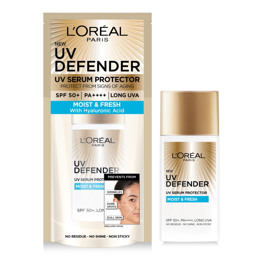 Hình ảnh sản phẩm kem chống nắng L'Oréal Paris UV Defender, SPF 50+, với thiết kế chai và bao bì màu vàng.