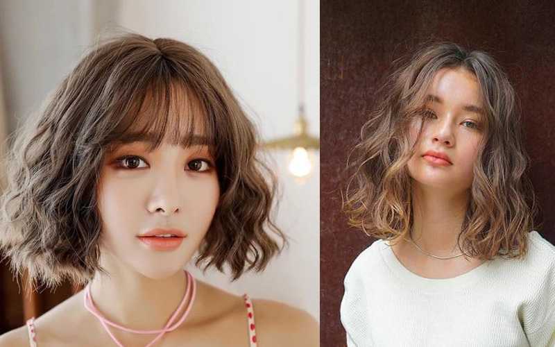Hai người với tóc ngắn xoăn nhẹ, một người mặc áo sáng, người kia mặc áo trắng, nền sáng và tối.