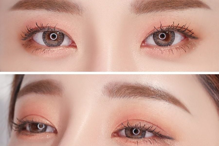 Cận cảnh mắt với trang điểm màu cam nhạt, kẻ mắt và mascara, thể hiện phong cách trang điểm tự nhiên.