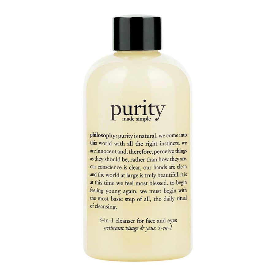 Chai sữa rửa mặt màu vàng nhạt có nắp đen, chữ "purity made simple" in trên nhãn phía trước.