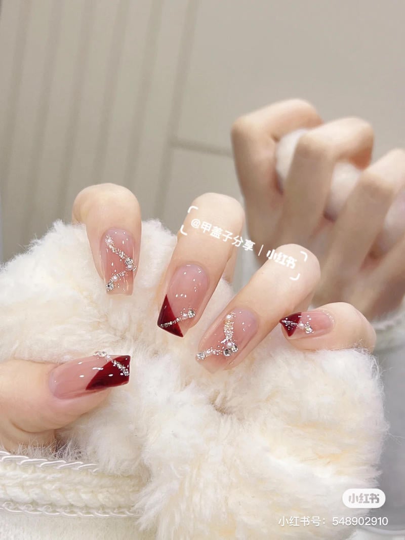 mau-nail-don-tet__38__3b34efe2f7ca43ddbd1deff938e7237f nail tết thanh lịch