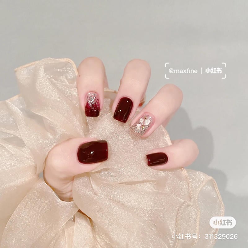 mau-nail-don-tet__39__d31114e0de594fe1b46b1a6e35066c3f nail tết đỏ sang chảnh