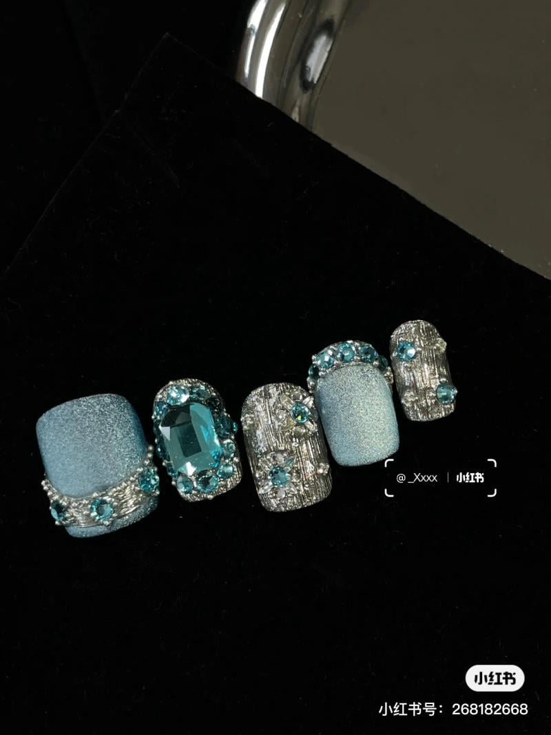 mau-nail-mat-meo-dep__41__cf155456c01f4143b059e0e7b803210b Nail mắt mèo xanh