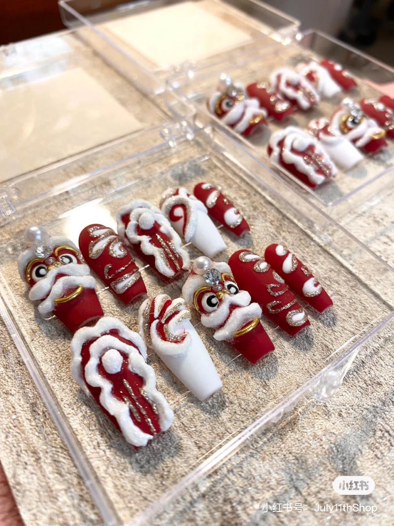 nail-tet-2023__12__f65c817fb0594408bdce282fd9b44920 nail tết đỏ sang chảnh