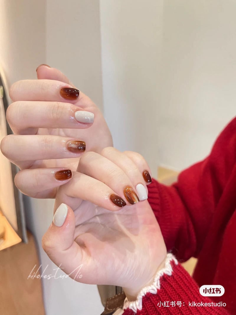 nail-tet-2023__17__bfba29fa14d1412f80fb48eb3a2846df nail tết ngắn 2025