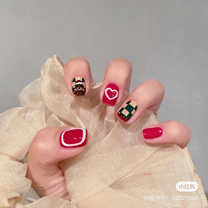 nail-tet-2023__5__7c8b5a3b1c1b4464911f064619b8d5e8 nail tết ngắn 2025