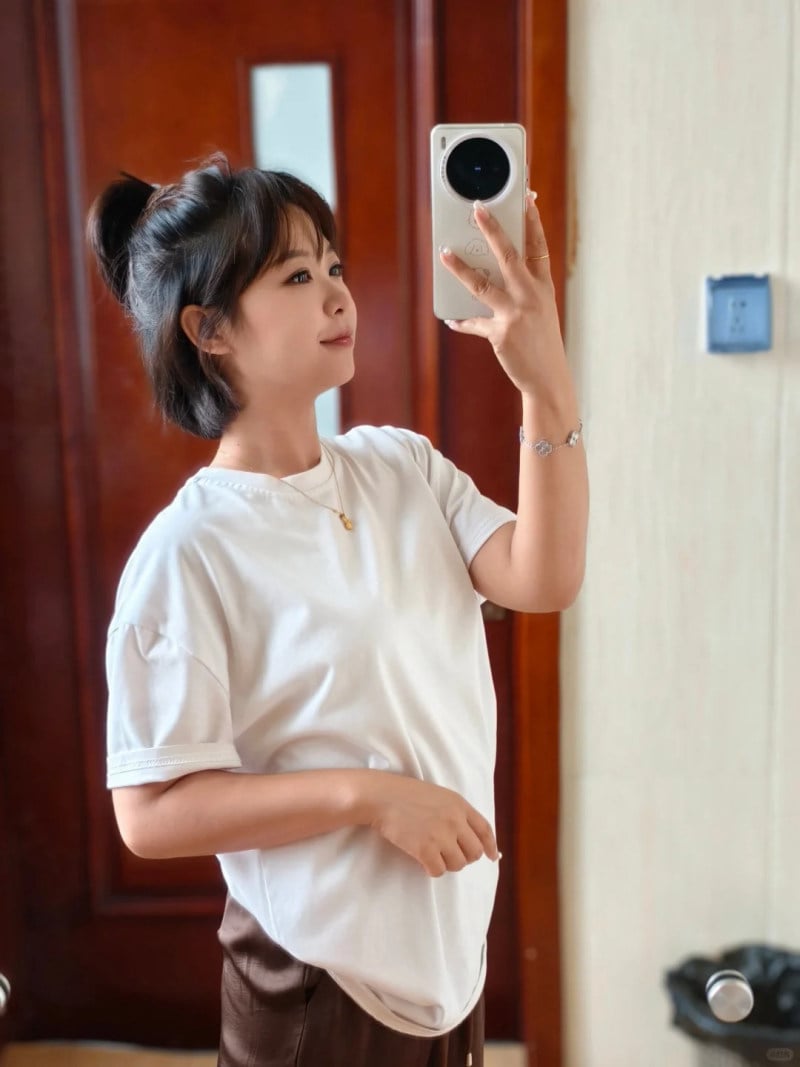 tóc ngắn layer búi nửa cho mặt tròn