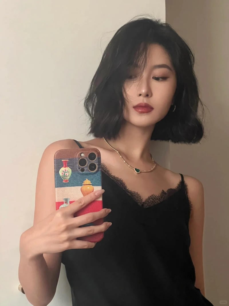 tóc xoăn lơi ngang vai