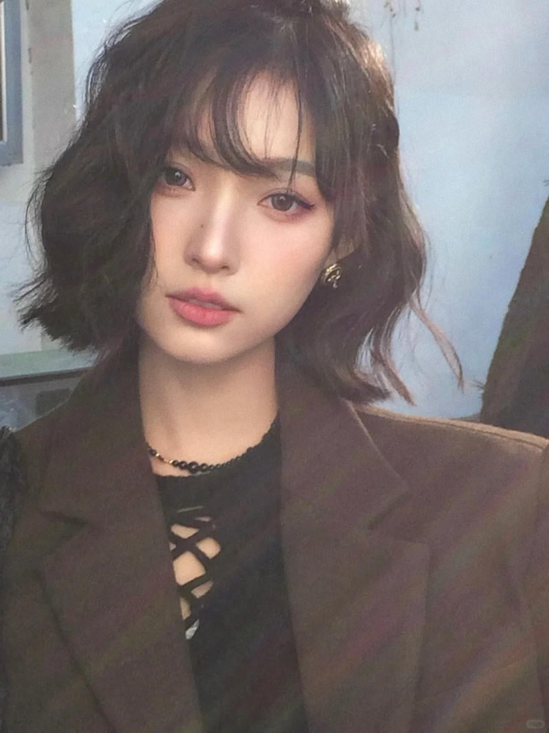 tóc xoăn lơi ngang vai