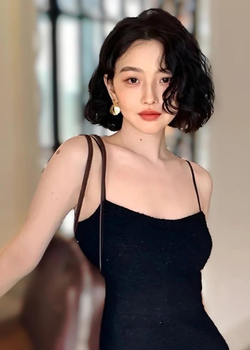 tóc xoăn lơi ngang vai