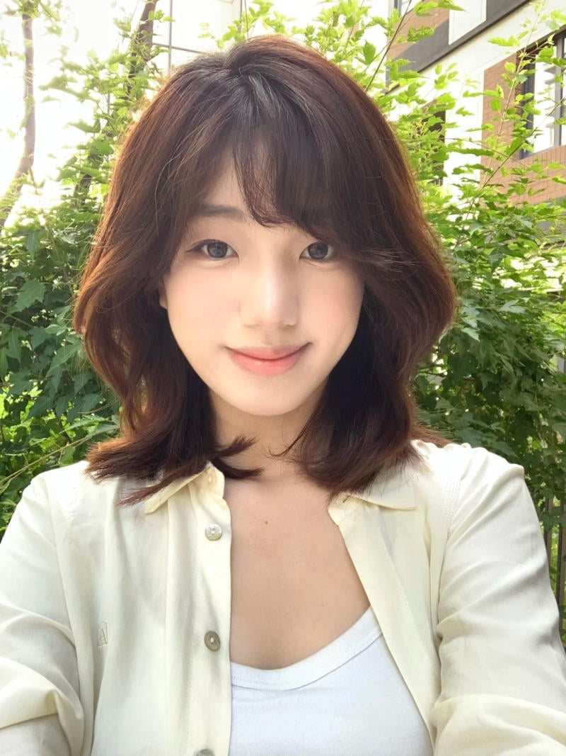 tóc xoăn lơi ngang vai