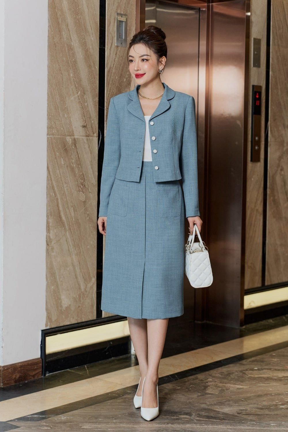 outfit-chat-da-tweed__12__f89964c403a84464bc91f64d67b85a19 Set blazer và chân váy dạ tweed xanh dương cho quý cô công sở