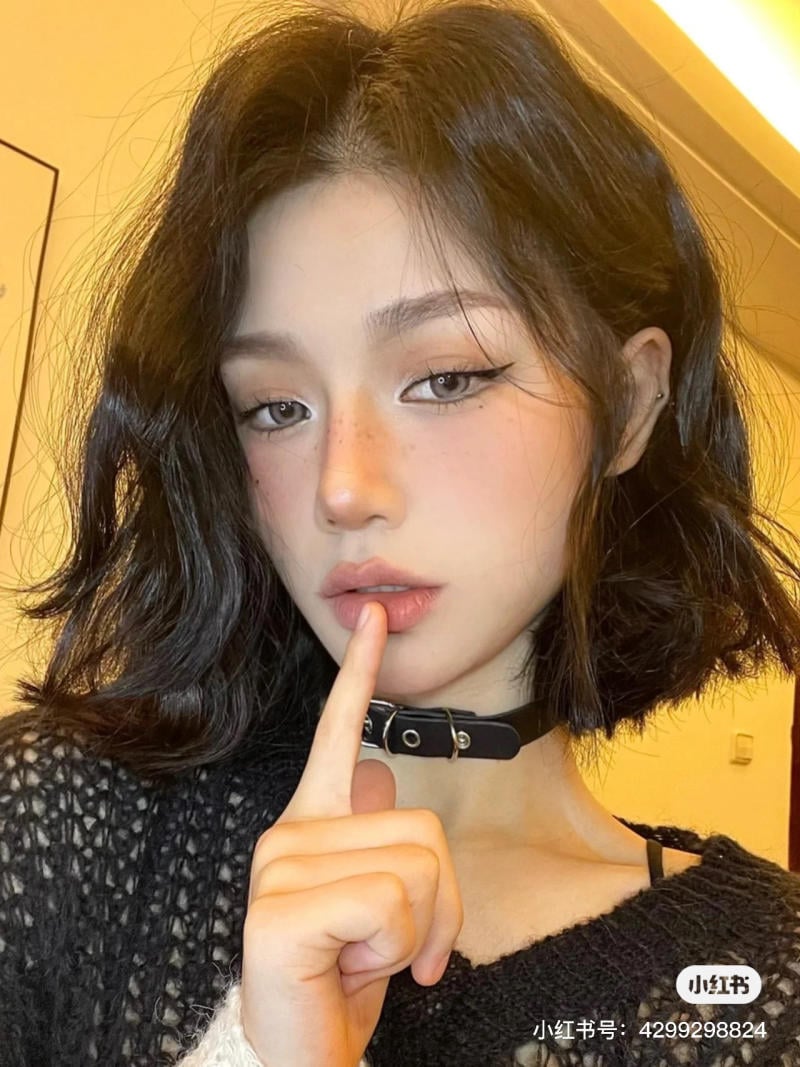 tóc xoăn sóng lơi ngang vai