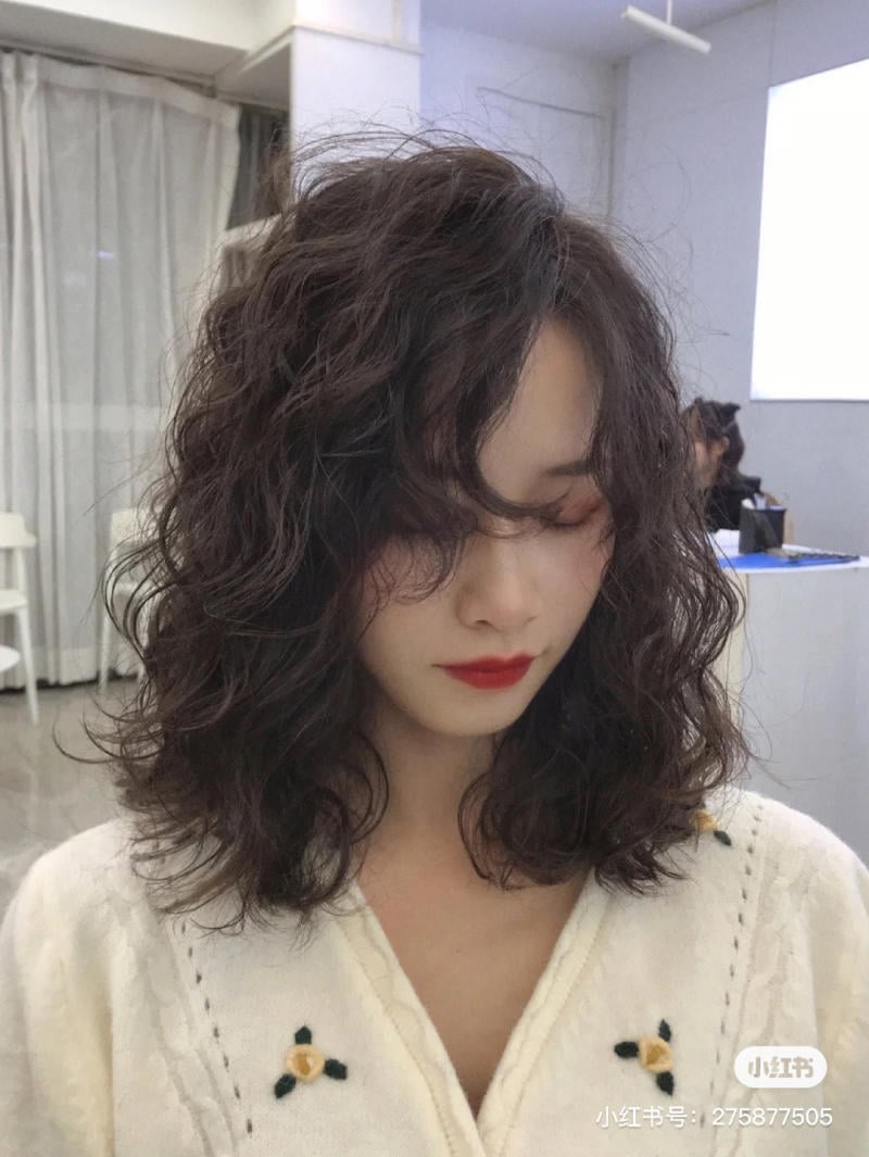 tóc xoăn sóng lơi ngang vai