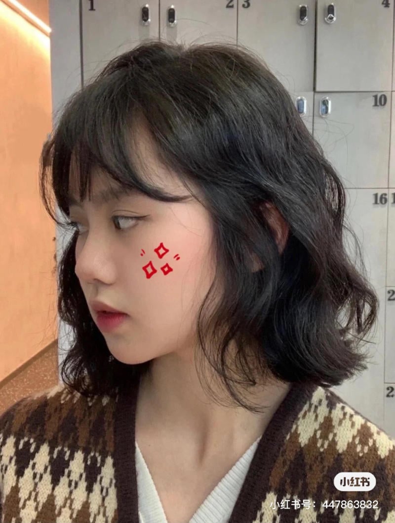 tóc xoăn sóng lơi ngang vai