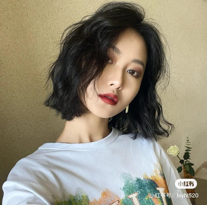 tóc xoăn sóng lơi ngang vai